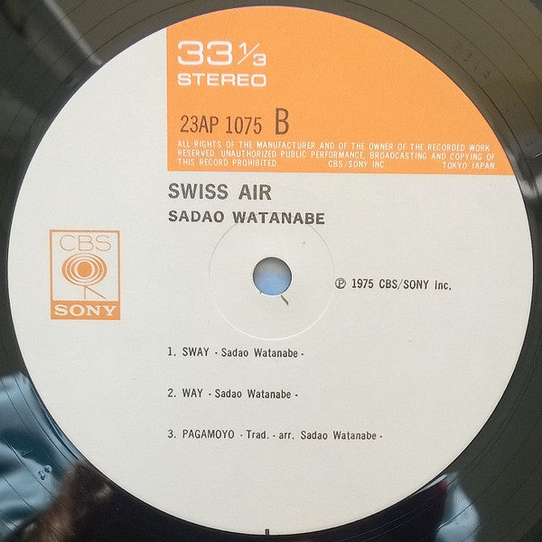Sadao Watanabe - Swiss Air (Vinyl, LP, Album, Reissue) Very Good Plus (VG+) / Very Good Plus (VG+)