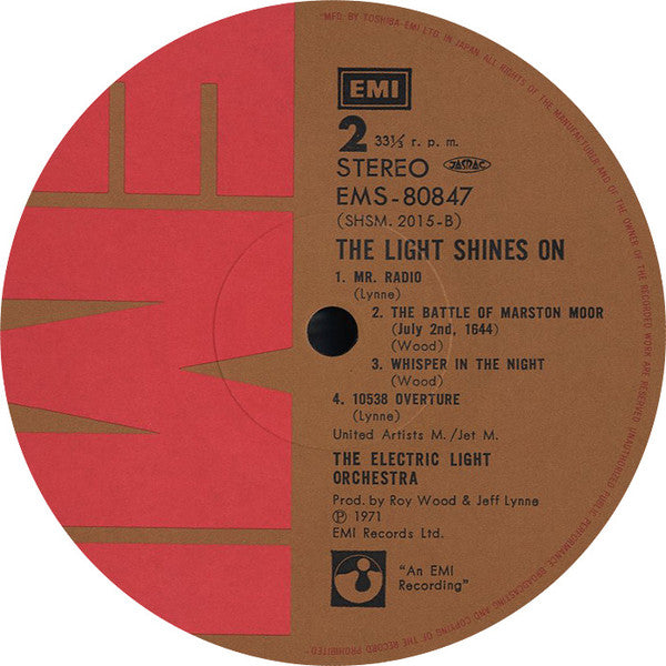 Electric Light Orchestra - The Light Shines On (Vinyl, LP, Compilation) Near Mint (NM or M-) / Very Good Plus (VG+)