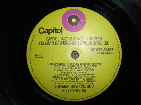 Coleman Hawkins And His Orchestra - Hollywood Stampede (Vinyl, LP, Compilation) Very Good Plus (VG+) / Very Good Plus (VG+)