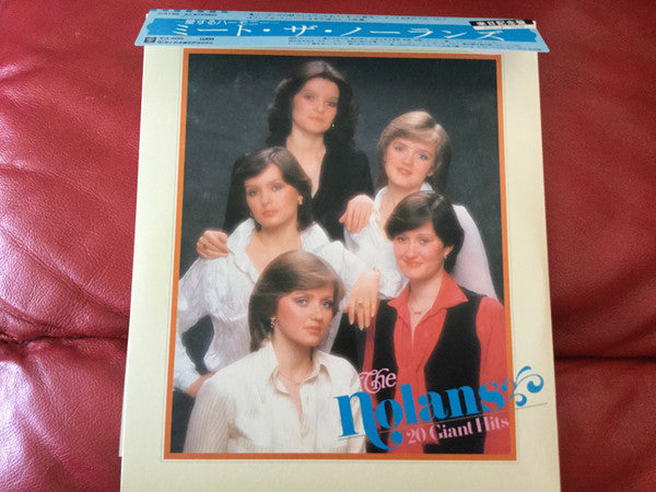 The Nolans - 20 Giant Hits (2xVinyl, 10", 33 ⅓ RPM, Album, Promo, Stereo) Very Good Plus (VG+) / Very Good (VG)