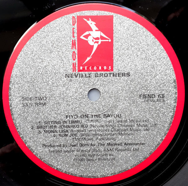 The Neville Brothers - Fiyo On The Bayou (Vinyl, LP, Album, Reissue) Near Mint (NM or M-) / Very Good Plus (VG+)