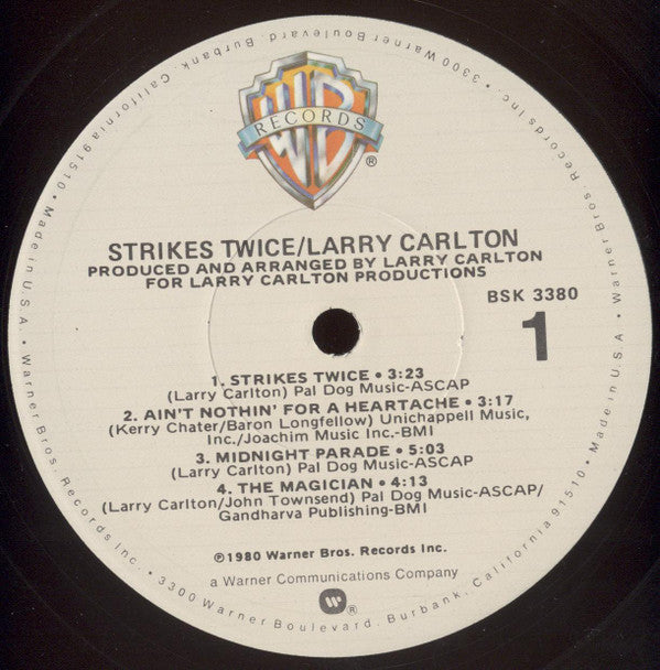 Larry Carlton - Strikes Twice (Vinyl, LP, Album, Misprint) Very Good Plus (VG+) / Very Good Plus (VG+)