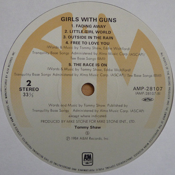 Tommy Shaw - Girls With Guns (Vinyl, LP, Album) Near Mint (NM or M-) / Very Good Plus (VG+)