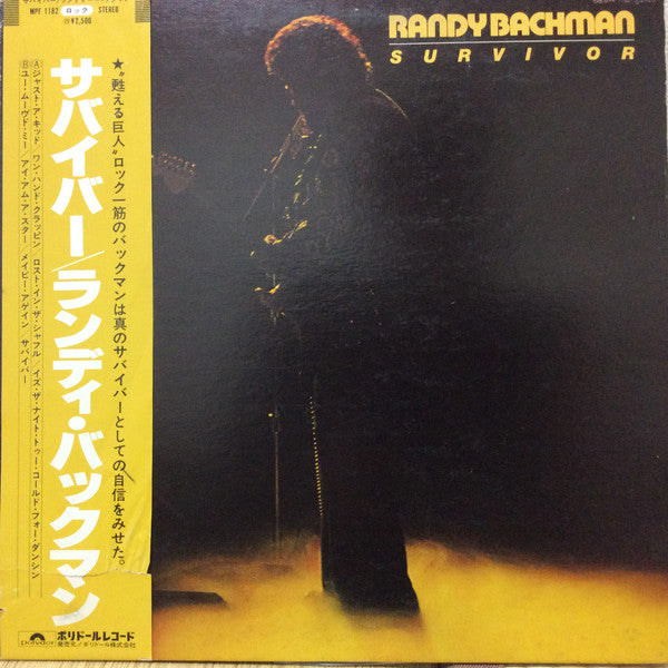 Randy Bachman - Survivor (Vinyl, LP, Album, Promo) Near Mint (NM or M-) / Very Good Plus (VG+)