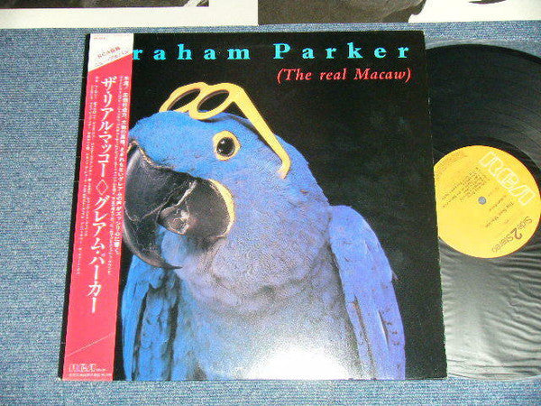 Graham Parker - The Real Macaw (Vinyl, LP, Album) Very Good Plus (VG+) / Very Good Plus (VG+)