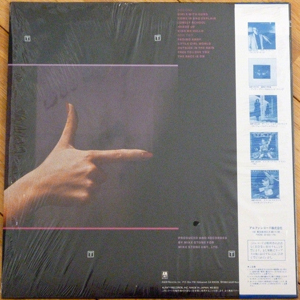 Tommy Shaw - Girls With Guns (Vinyl, LP, Album) Near Mint (NM or M-) / Very Good Plus (VG+)