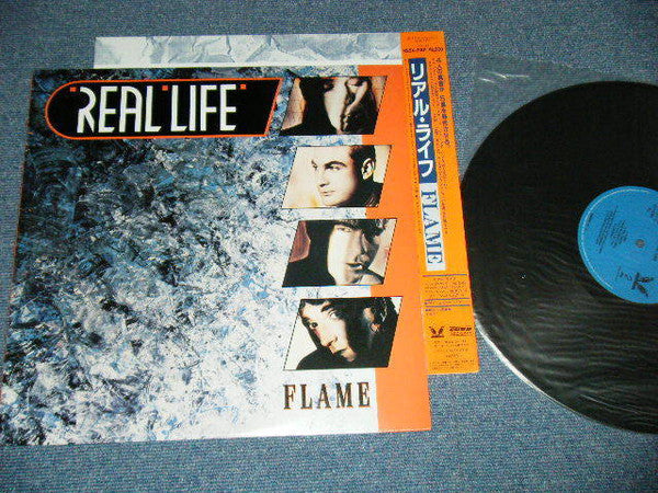 Real Life - Flame (Vinyl, LP, Album) Very Good Plus (VG+) / Very Good (VG)