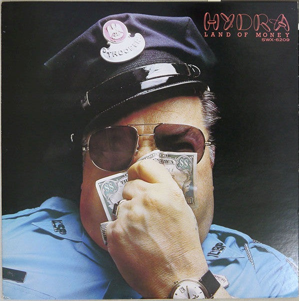 Hydra (13) - Land Of Money (Vinyl, LP, Album) Near Mint (NM or M-) / Very Good Plus (VG+)