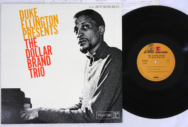 Duke Ellington - Duke Ellington Presents The Dollar Brand Trio (Vinyl, LP, Album, Reissue, Stereo) Near Mint (NM or M-) / Very Good Plus (VG+)