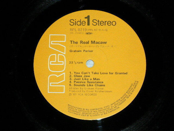 Graham Parker - The Real Macaw (Vinyl, LP, Album) Very Good Plus (VG+) / Very Good Plus (VG+)