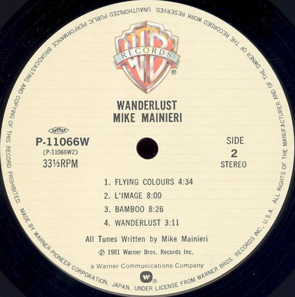 Mike Mainieri - Wanderlust (Vinyl, LP, Album) Near Mint (NM or M-) / Very Good Plus (VG+)