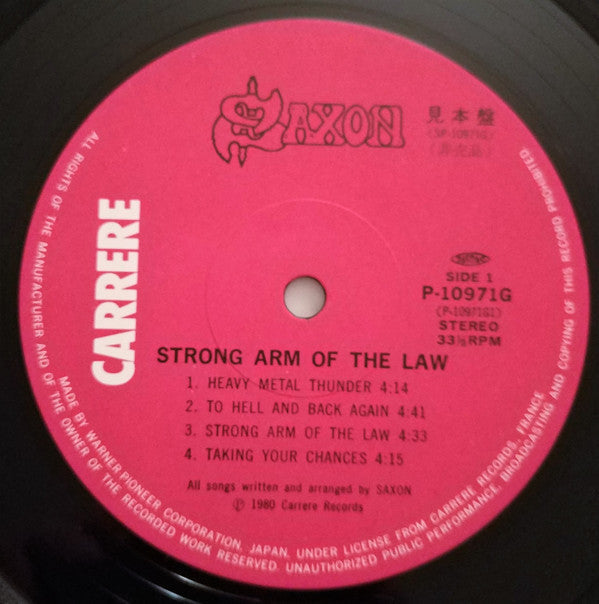 Saxon - Strong Arm Of The Law (Vinyl, LP, Album, Promo) Very Good Plus (VG+) / Good Plus (G+)