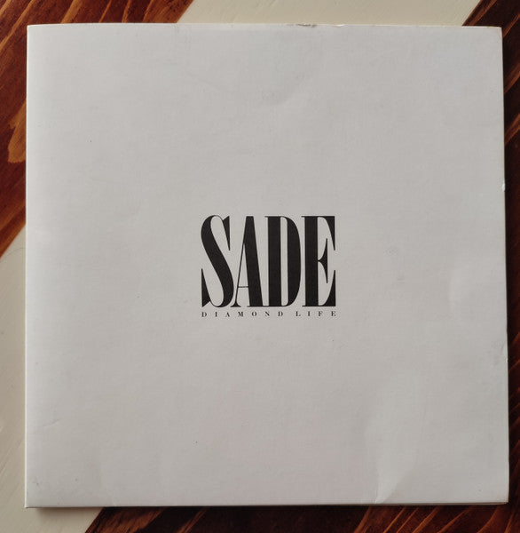 Sade - Diamond Life (Vinyl, LP, Album) Near Mint (NM or M-) / Very Good (VG)