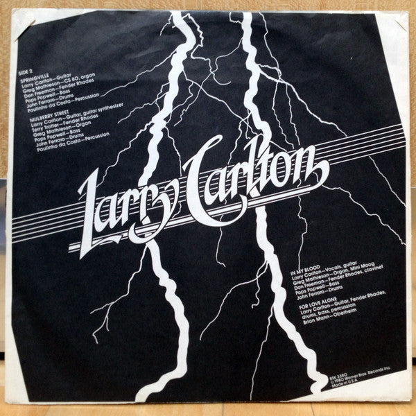 Larry Carlton - Strikes Twice (Vinyl, LP, Album) Very Good (VG) / Very Good (VG)