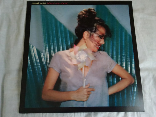 Kimiko Kasai - Round And Round (Vinyl, LP, Album, Promo, Stereo) Very Good Plus (VG+) / Very Good Plus (VG+)