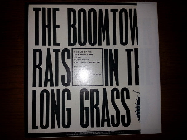 The Boomtown Rats - In The Long Grass (Vinyl, LP, Album) Near Mint (NM or M-) / Near Mint (NM or M-)