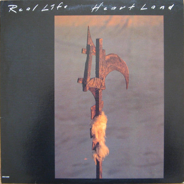 Real Life - Heartland (Vinyl, LP, Album) Very Good (VG) / Very Good (VG)