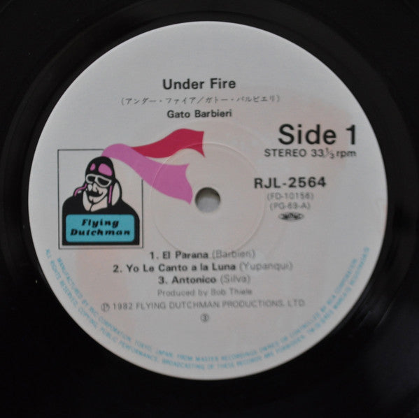 Gato Barbieri - Under Fire (Vinyl, LP, Album, Stereo) Very Good Plus (VG+) / Very Good (VG)