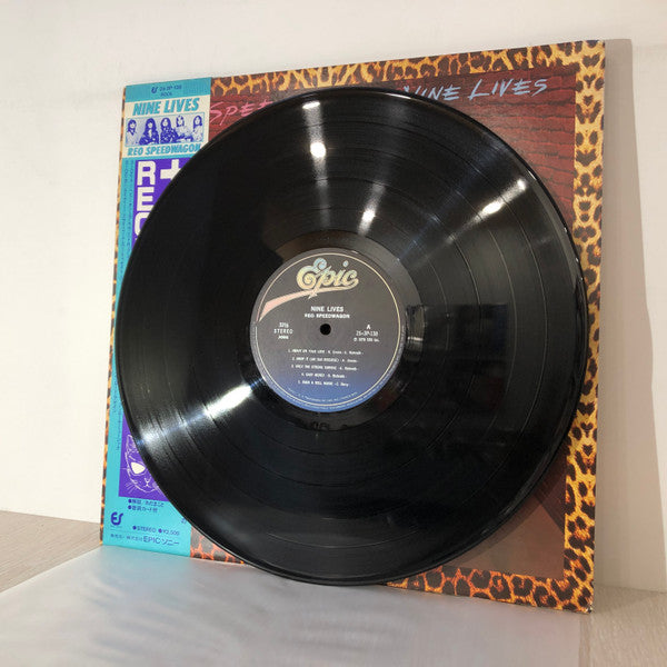 REO Speedwagon - Nine Lives (Vinyl, LP, Album) Very Good (VG) / Very Good Plus (VG+)