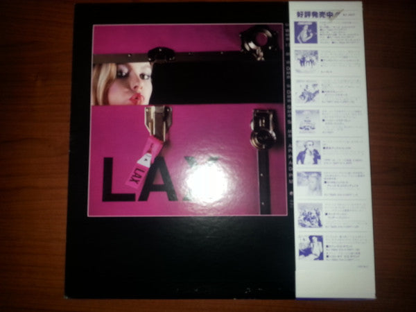 LAX - Under Cover Lover (Vinyl, LP, Album) Very Good Plus (VG+) / Good Plus (G+)