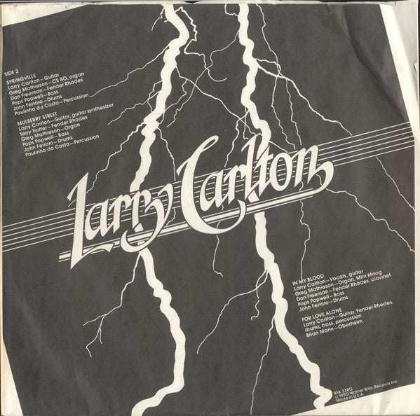Larry Carlton - Strikes Twice (Vinyl, LP, Album, Misprint) Very Good Plus (VG+) / Very Good Plus (VG+)