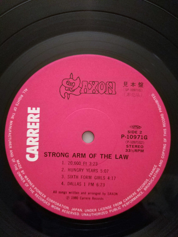 Saxon - Strong Arm Of The Law (Vinyl, LP, Album, Promo) Very Good Plus (VG+) / Good Plus (G+)