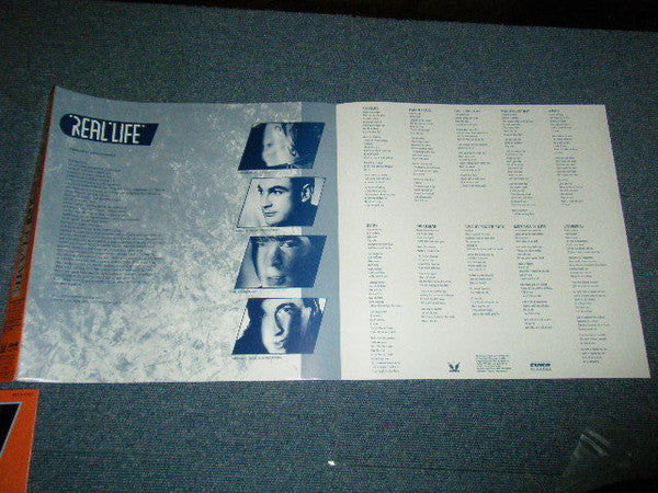 Real Life - Flame (Vinyl, LP, Album) Very Good Plus (VG+) / Very Good (VG)