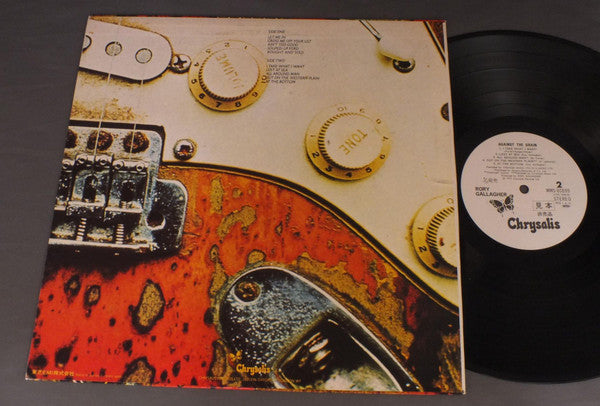 Rory Gallagher - Against The Grain (Vinyl, LP, Album, Promo, Reissue) Very Good Plus (VG+) / Very Good (VG)