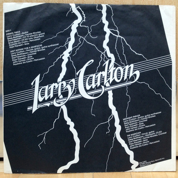 Larry Carlton - Strikes Twice (Vinyl, LP, Album) Very Good (VG) / Very Good (VG)