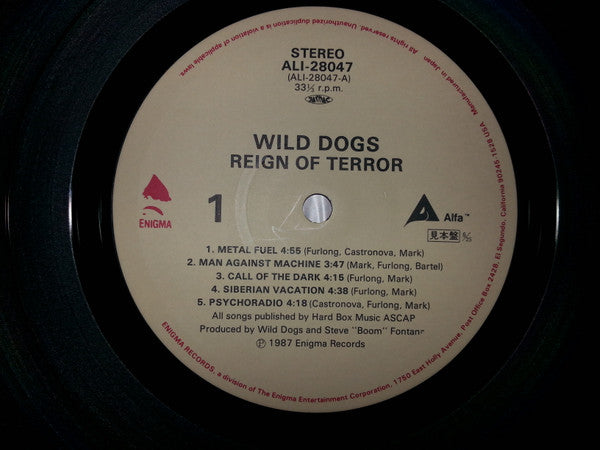 Wild Dogs - Reign Of Terror (Vinyl, LP, Album, Promo) Near Mint (NM or M-) / Very Good Plus (VG+)