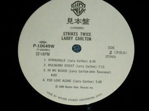 Larry Carlton - Strikes Twice = ストライクス・トワイス (Vinyl, LP, Album, Promo) Very Good (VG) / Good Plus (G+)