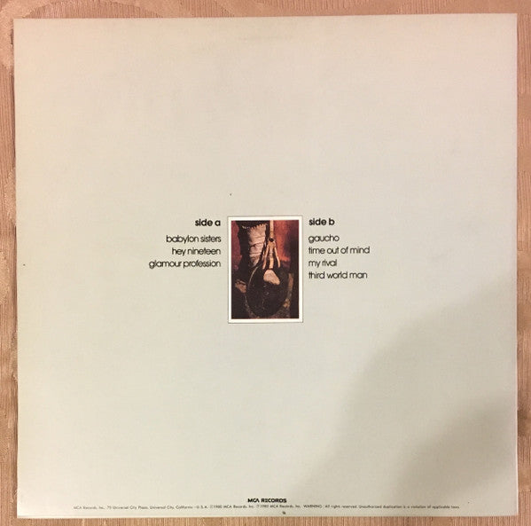 Steely Dan - Gaucho (Vinyl, LP, Album, Reissue) Near Mint (NM or M-) / Near Mint (NM or M-)