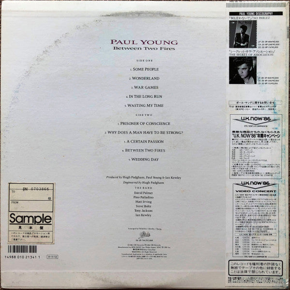 Paul Young - Between Two Fires (Vinyl, LP, Album, Promo) Very Good Plus (VG+) / Very Good Plus (VG+)