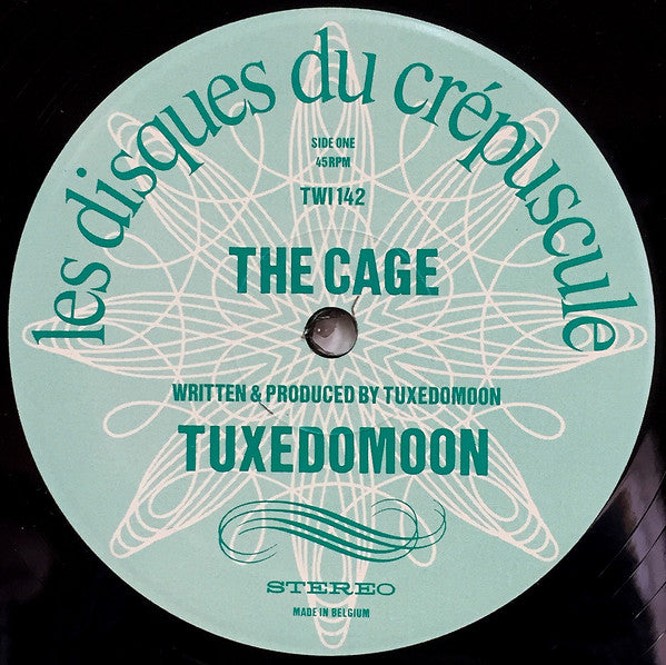 Tuxedomoon - Short Stories: The Cage · This Beast (Vinyl, 12", 45 RPM) Very Good Plus (VG+) / Very Good Plus (VG+)
