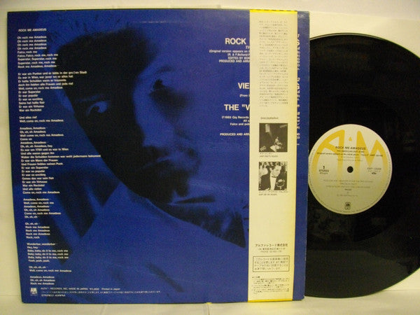 Falco - Rock Me Amadeus / Vienna Calling (Vinyl, 12", 45 RPM, Stereo) Very Good Plus (VG+) / Very Good Plus (VG+)