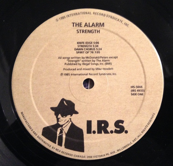 The Alarm - Strength (Vinyl, LP, Album) Very Good Plus (VG+) / Very Good (VG)