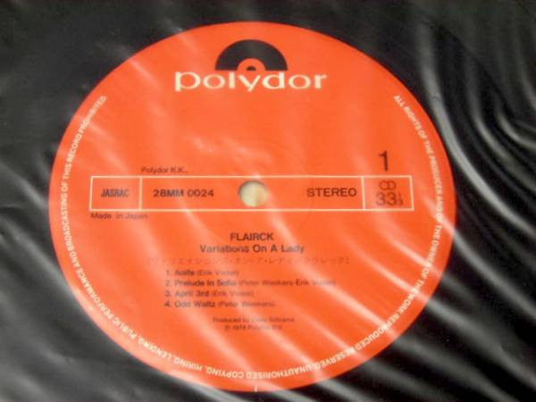 Flairck - Variations On A Lady (Vinyl, LP, Album) Near Mint (NM or M-) / Very Good Plus (VG+)