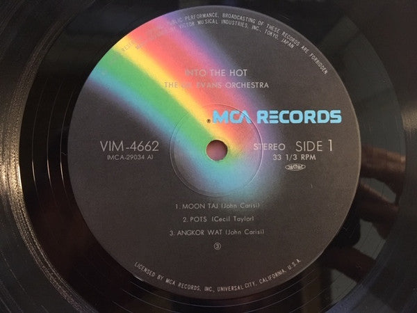 Gil Evans And His Orchestra - Into The Hot (Vinyl, LP, Reissue, Stereo) Very Good Plus (VG+) / Poor (P)