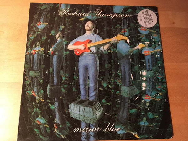 Richard Thompson - Mirror Blue (Vinyl, LP, Album) Very Good Plus (VG+) / Very Good Plus (VG+)