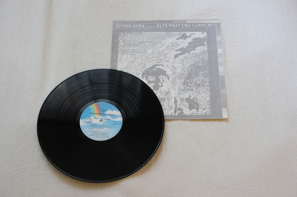 Spyro Gyra - Alternating Currents (Vinyl, LP, Album, Promo) Good Plus (G+) / Good Plus (G+)