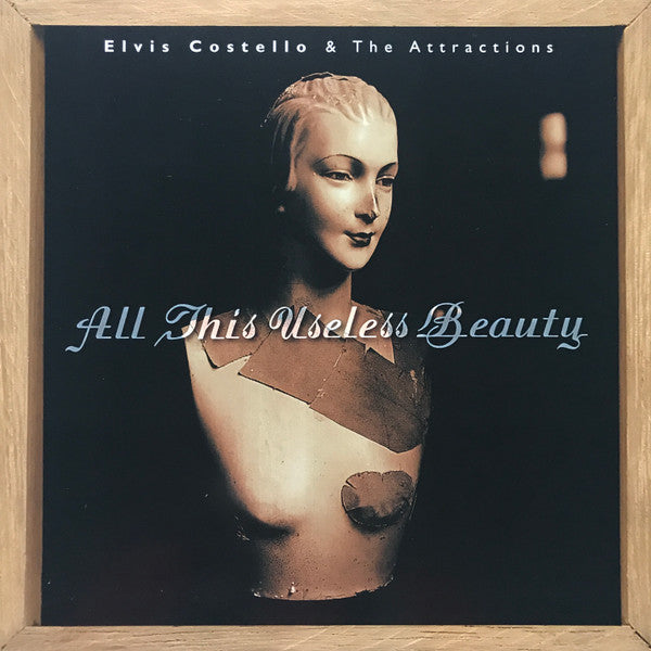 Elvis Costello & The Attractions - All This Useless Beauty (Vinyl, LP, Album) Very Good (VG) / Very Good Plus (VG+)