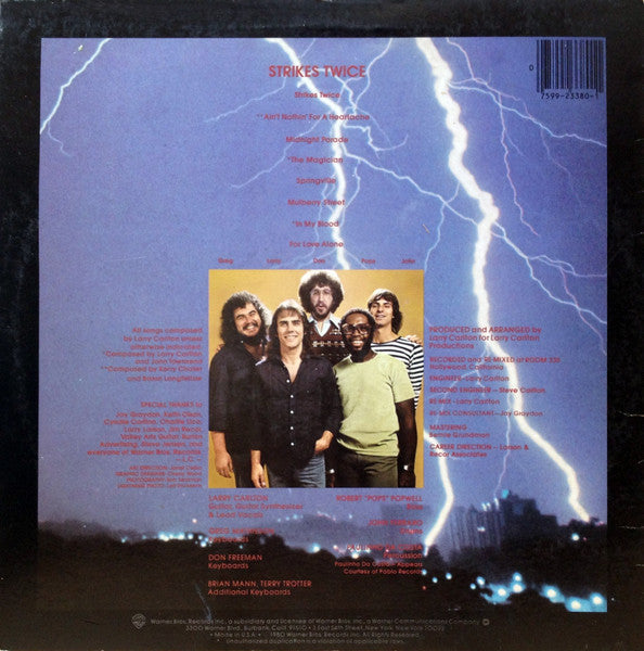 Larry Carlton - Strikes Twice (Vinyl, LP, Album) Very Good (VG) / Very Good (VG)