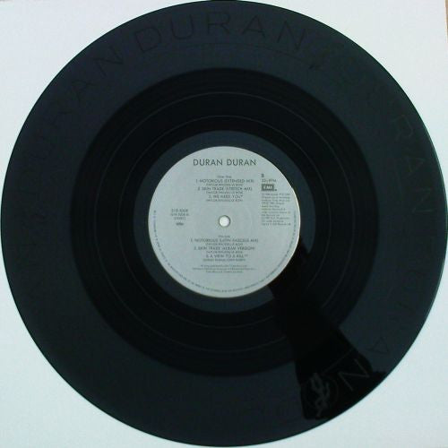 Duran Duran - Strange Behavior (Vinyl, 12", 33 ⅓ RPM, Etched) Very Good (VG) / Very Good Plus (VG+)