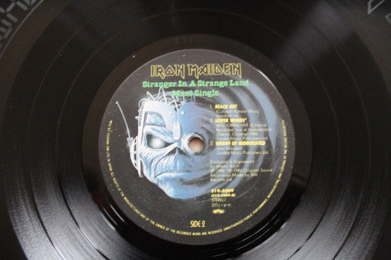 Iron Maiden - Stranger In A Strange Land (Vinyl, 12", 33 ⅓ RPM, Maxi-Single, Etched) Near Mint (NM or M-) / Very Good Plus (VG+)